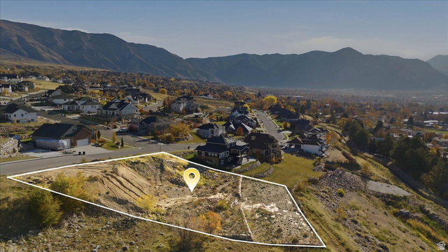 1211 West Fallow Way Ogden, UT 84414 - Photo 2 of 20 Aerial view of property's location featuring nearby suburban area and property parcel outlined