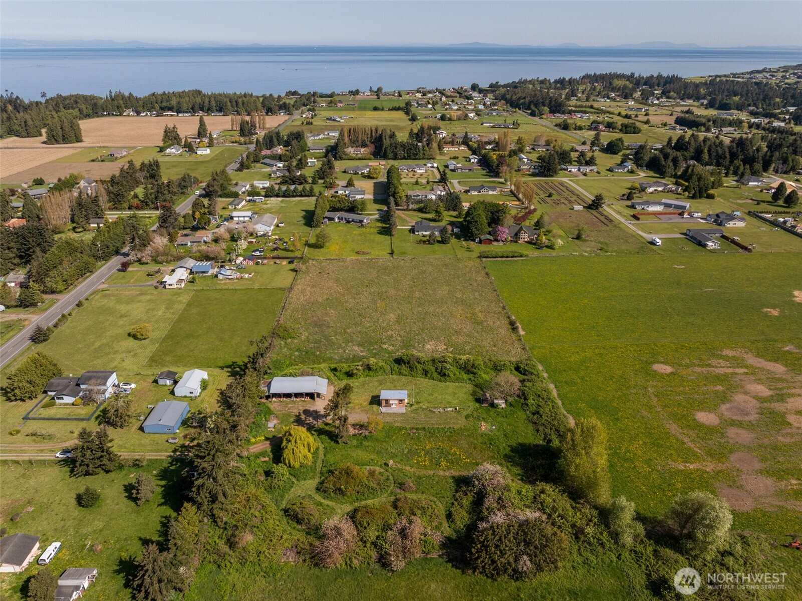 148 Gunn Road Port Angeles, WA 98362 - Photo 7 of 38 an aerial view of residential houses with outdoor space
