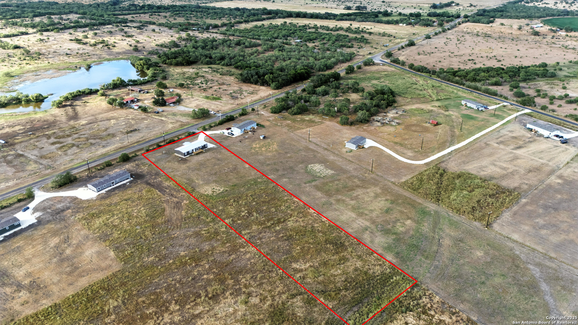 2479 Fm 1332 Jourdanton, TX 78026 - Photo 17 of 18 a view of a yard with an outdoor space