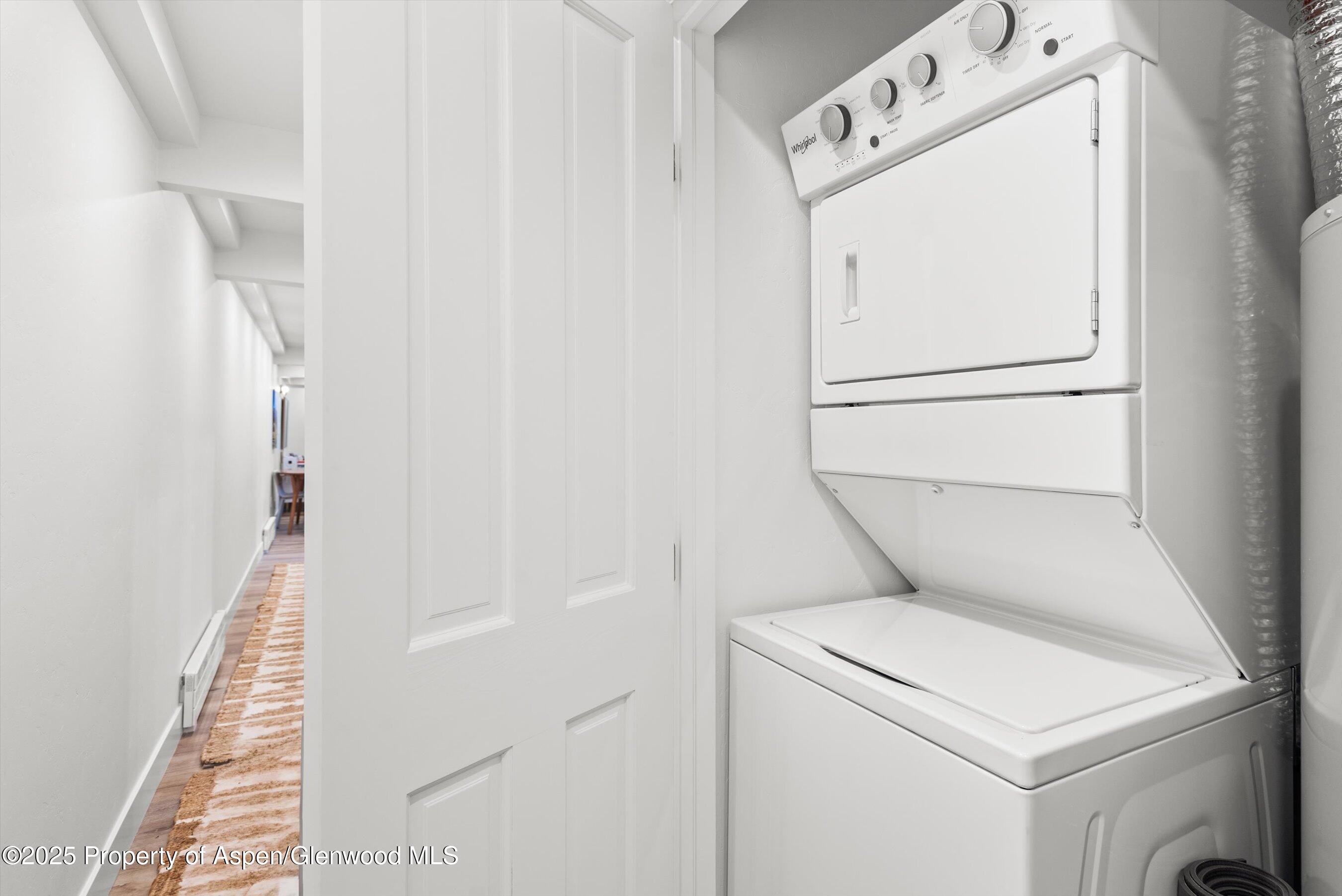 901 East Hyman Avenue, Unit 1 Aspen, CO 81611 - Photo 9 of 12 a utility room with dryer and washer