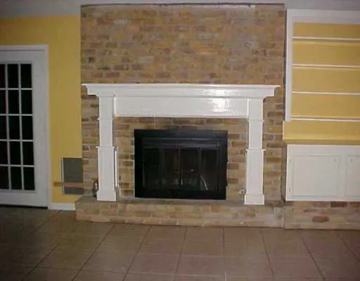 a living room with a fireplace