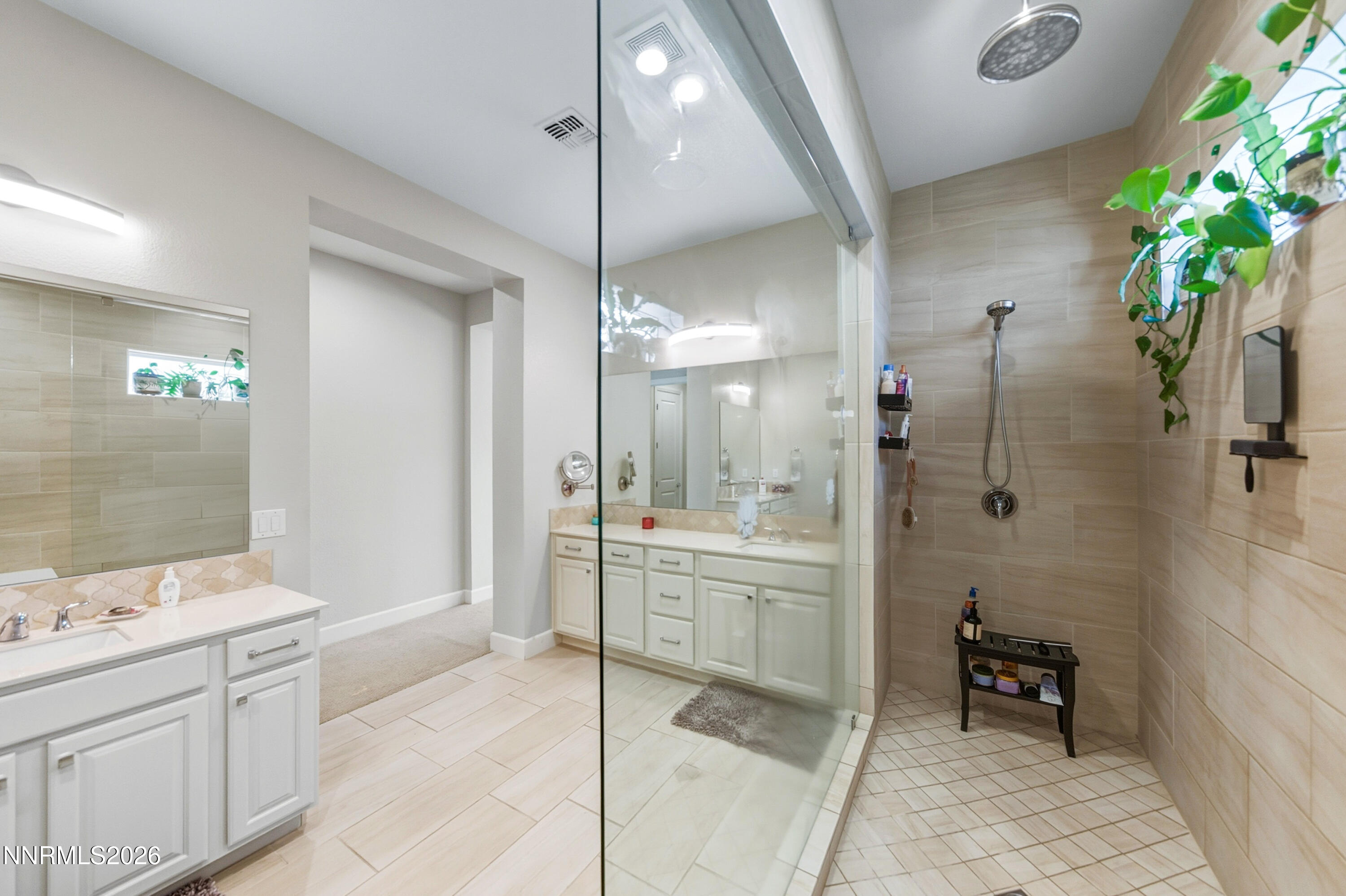 2468 Sparstone Drive Reno, NV 89521 - Photo 19 of 39 a bathroom with a granite countertop sink a toilet and shower