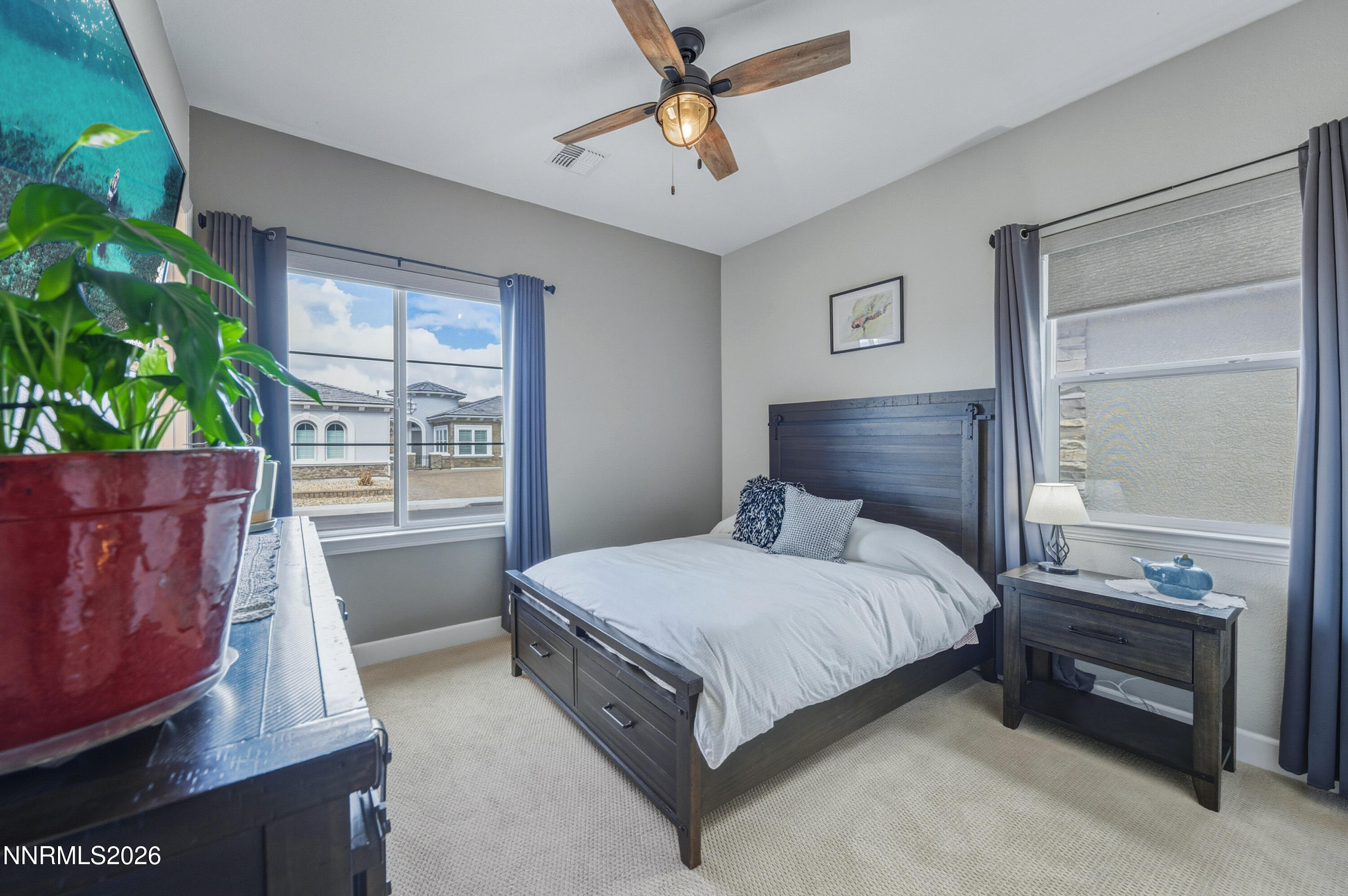 2468 Sparstone Drive Reno, NV 89521 - Photo 25 of 39 a bedroom with a bed dresser and a window
