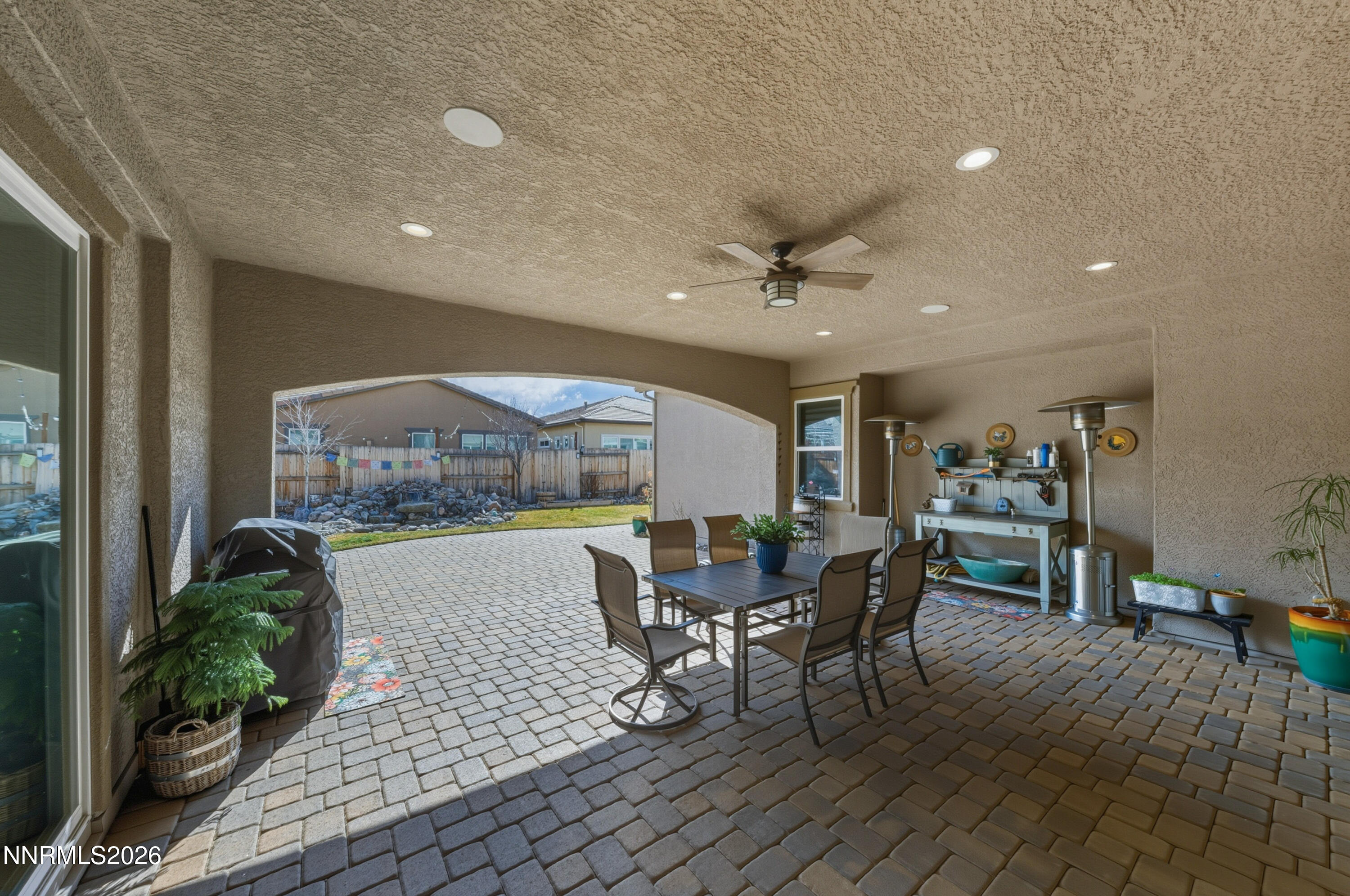 2468 Sparstone Drive Reno, NV 89521 - Photo 29 of 39 a view of a dining room with furniture window and wooden floor