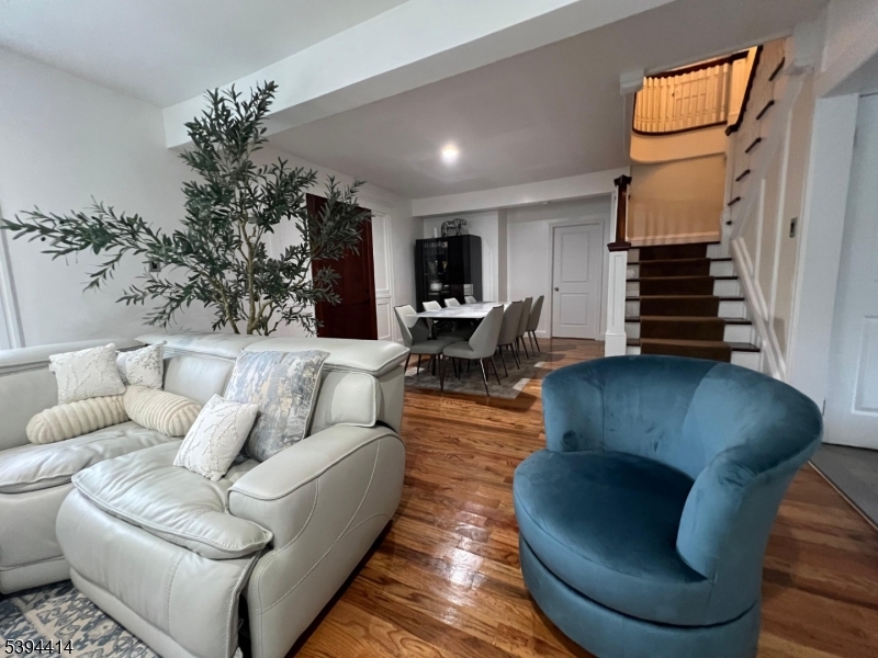 865 Westfield Avenue Elizabeth, NJ 07208 - Photo 20 of 26 a living room with furniture and a potted plant