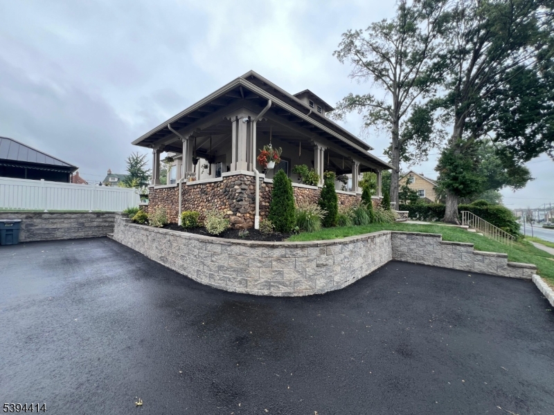 865 Westfield Avenue Elizabeth, NJ 07208 - Photo 2 of 26 a view of a house in a backyard