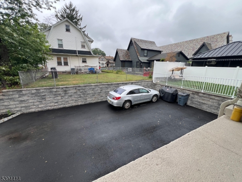 865 Westfield Avenue Elizabeth, NJ 07208 - Photo 4 of 26 a car parked in front of a house