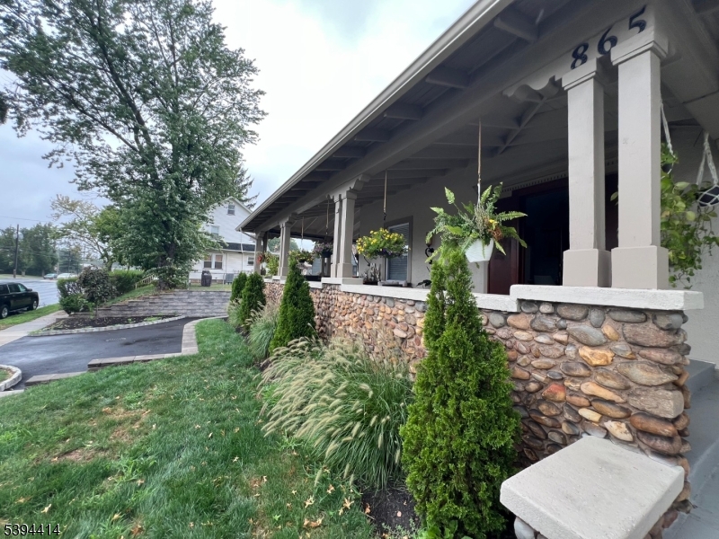 865 Westfield Avenue Elizabeth, NJ 07208 - Photo 5 of 26 a view of house with a yard and potted plants