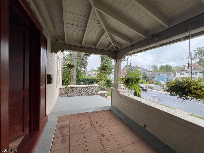 865 Westfield Avenue Elizabeth, NJ 07208 - Photo 8 of 26 a view of a porch and garden