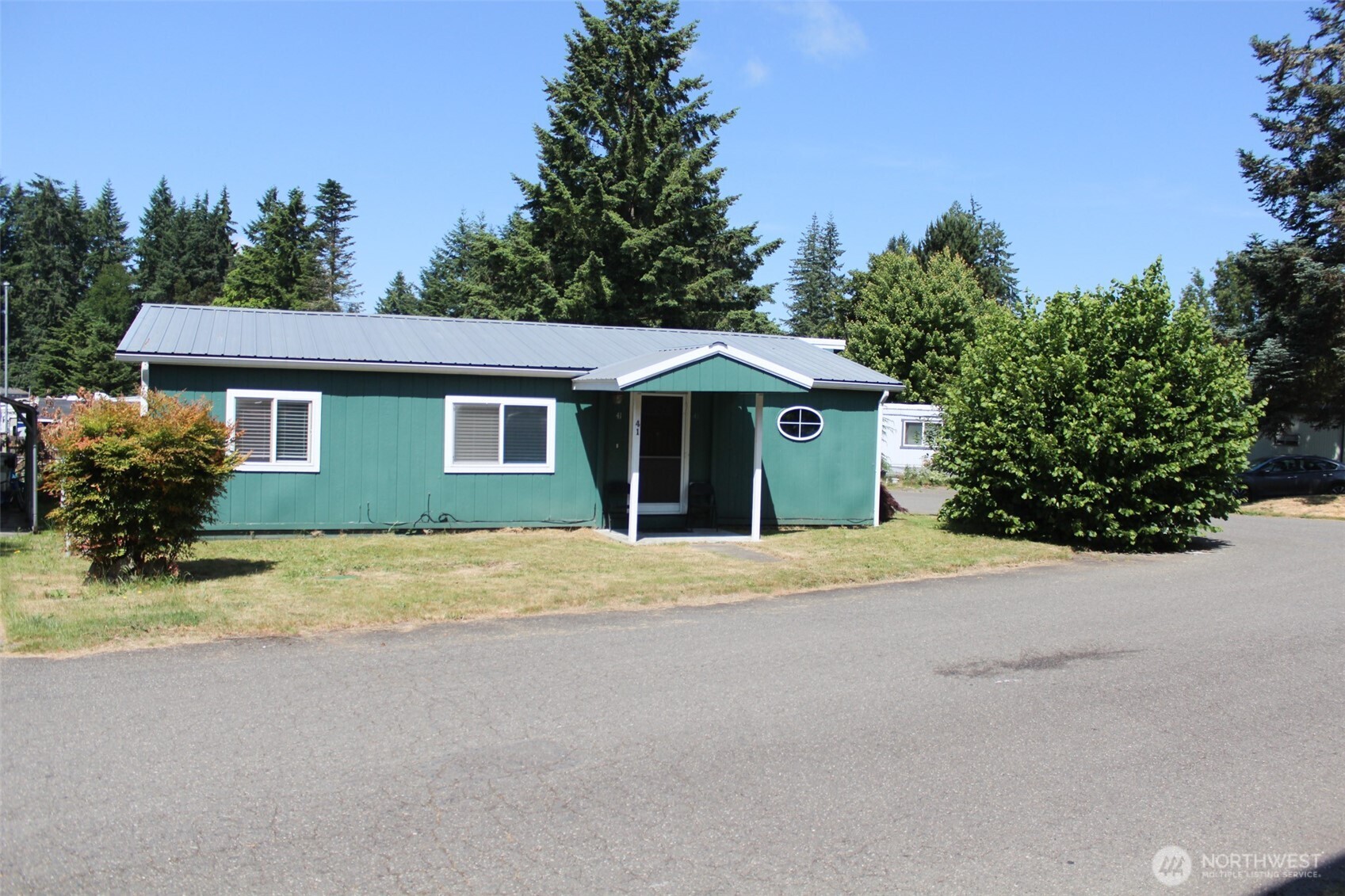 front view of a house and a yard