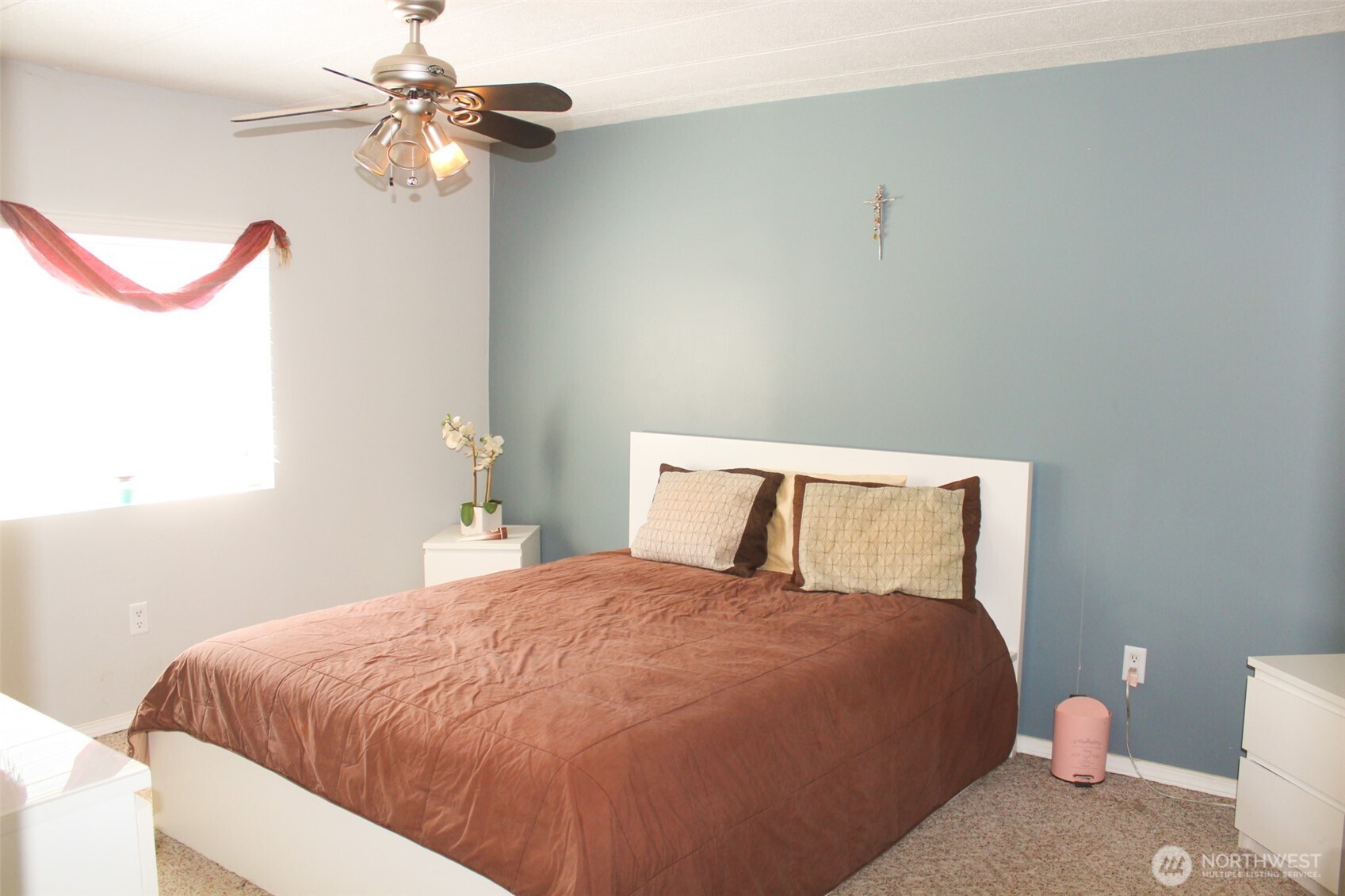 5705 Littlerock Road Southwest, Unit 41 Tumwater, WA 98512 - Photo 12 of 18 a bedroom with a bed and a chandelier