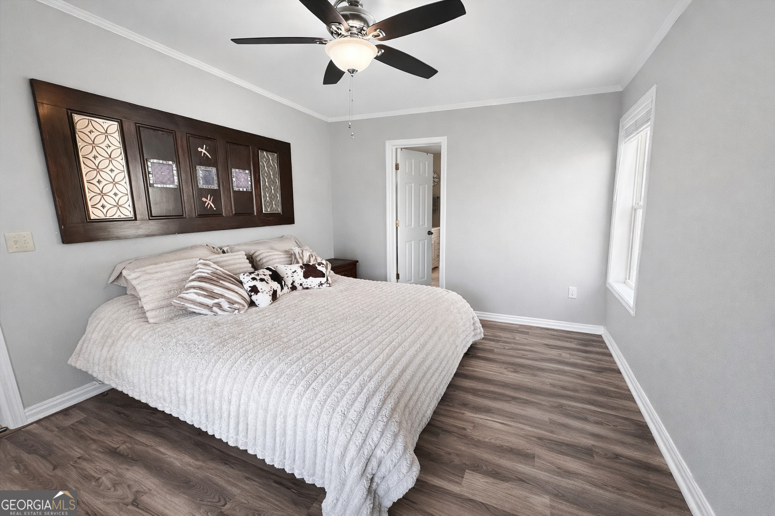 1947 Ivy Mountain Road Clarkesville, GA 30523 - Photo 11 of 31 a bedroom with a bed and painting on the wall