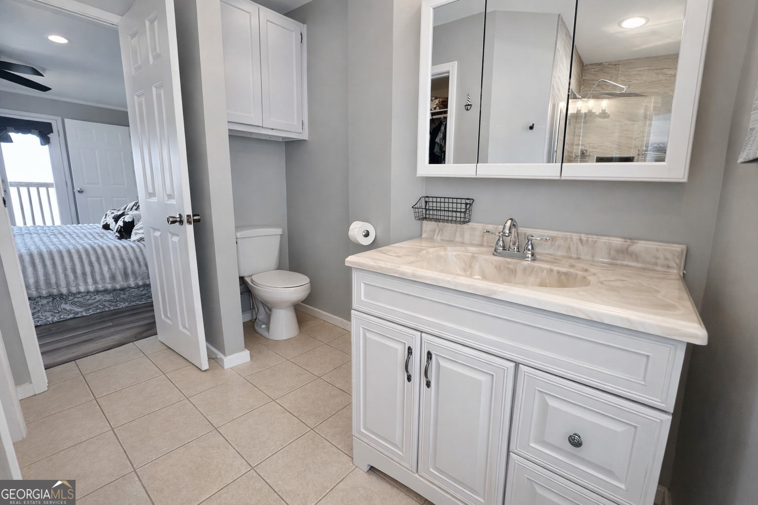 1947 Ivy Mountain Road Clarkesville, GA 30523 - Photo 12 of 31 a bathroom with a sink a toilet and a mirror