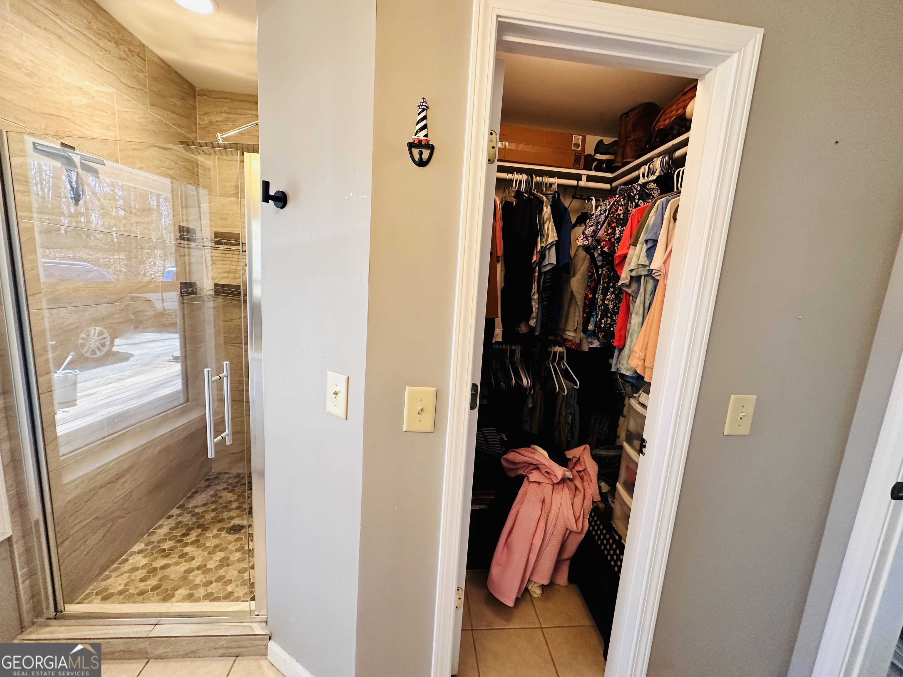 1947 Ivy Mountain Road Clarkesville, GA 30523 - Photo 14 of 31 a view of walk in closet with clothes and shoes