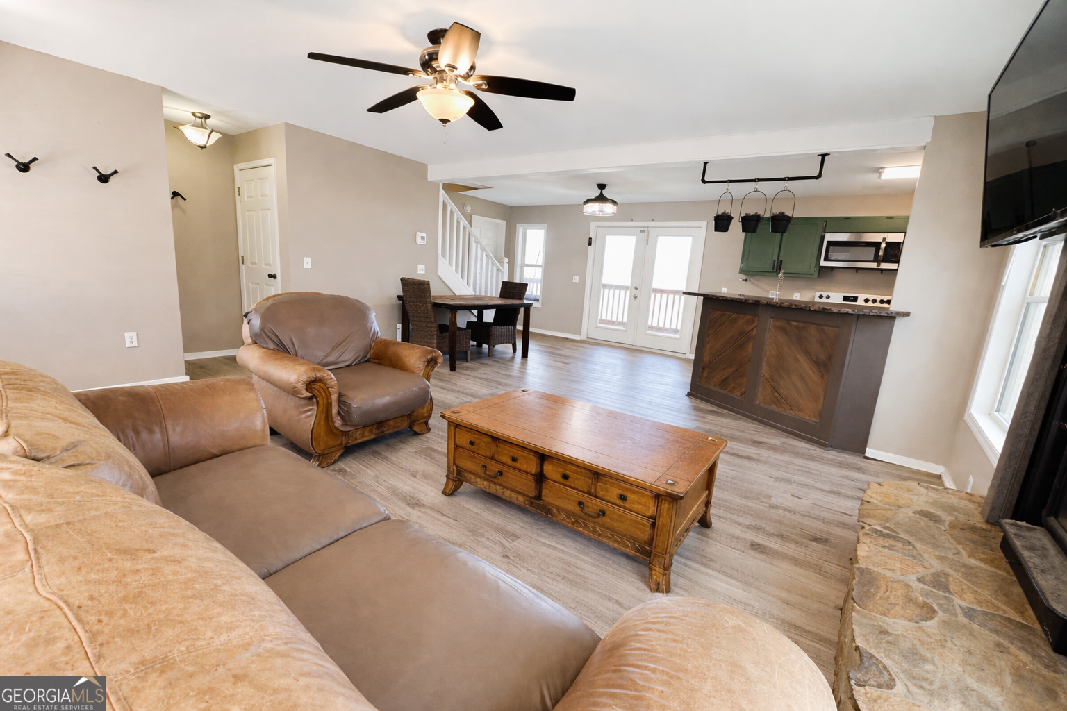 1947 Ivy Mountain Road Clarkesville, GA 30523 - Photo 4 of 31 a living room with furniture and a flat screen tv