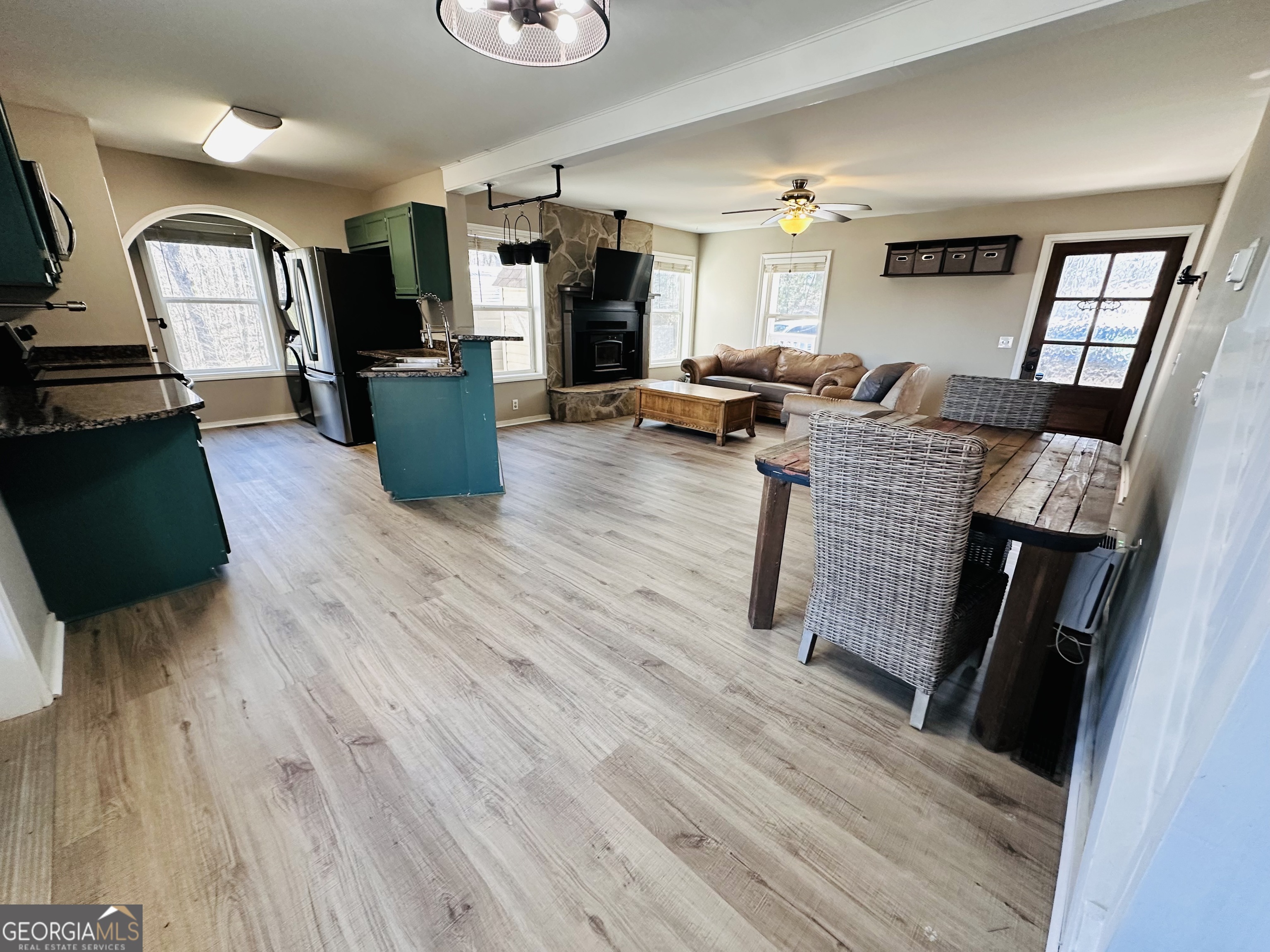 1947 Ivy Mountain Road Clarkesville, GA 30523 - Photo 10 of 31 a living room with furniture and a wooden floor