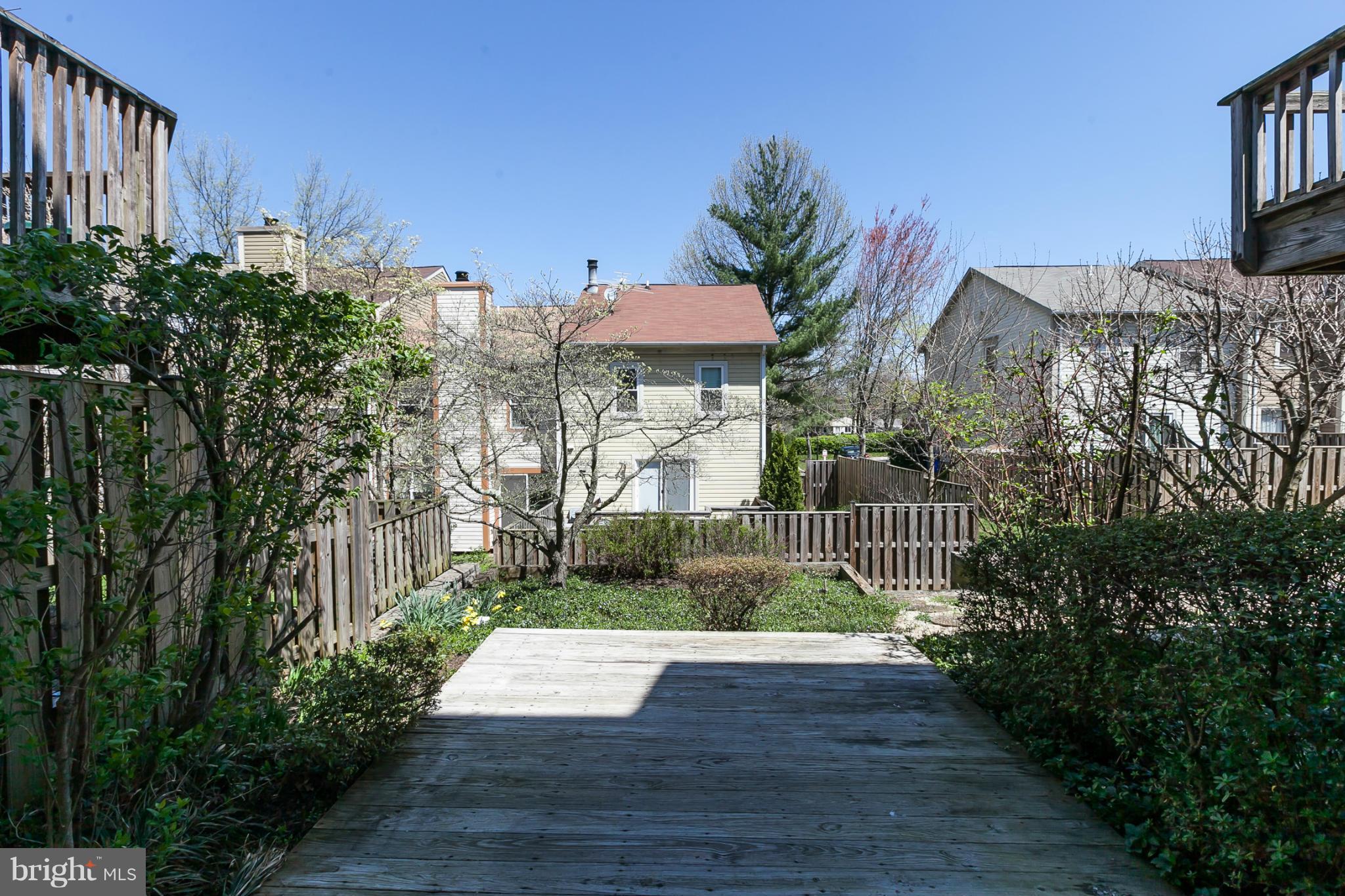 2846 Schoolhouse Circle Silver Spring, MD 20902 - Photo 26 of 28 a view of potted plants in front of house