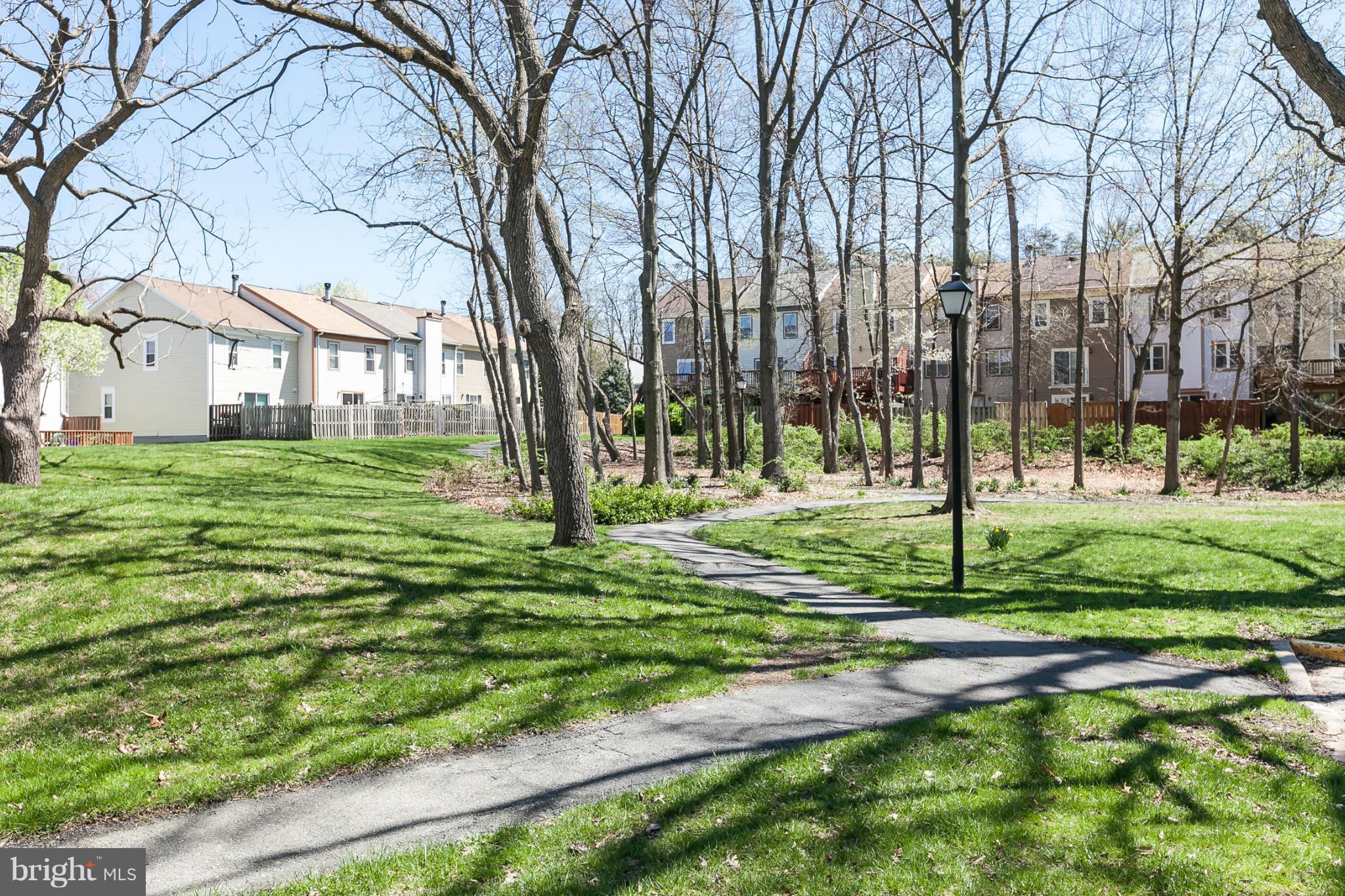 2846 Schoolhouse Circle Silver Spring, MD 20902 - Photo 27 of 28 a view of a park with large trees