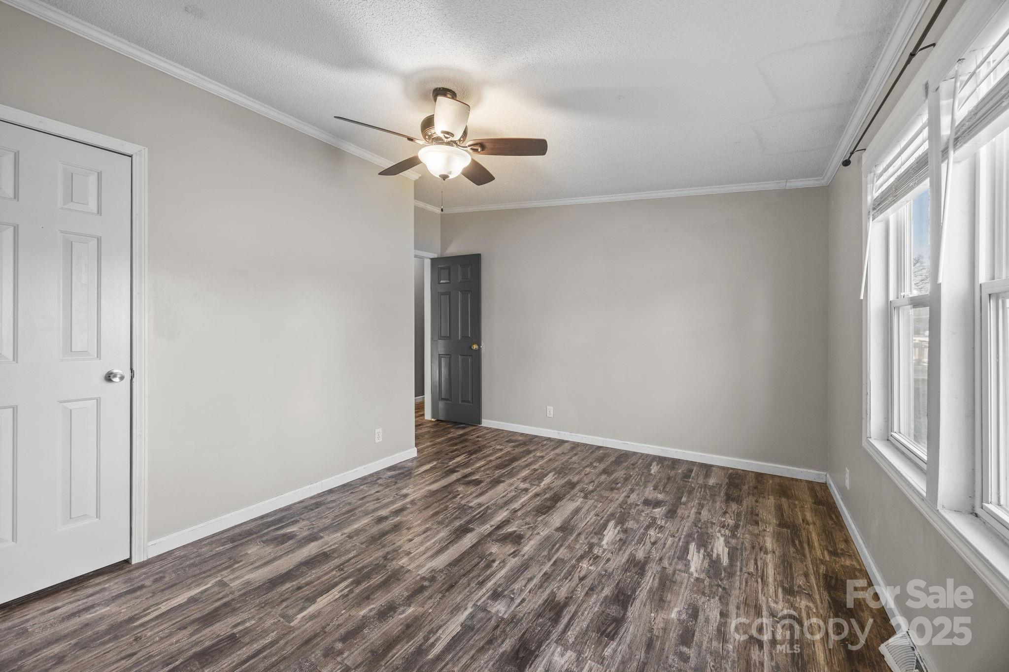21465 Old Beatty Ford Road Richfield, NC 28137 - Photo 20 of 41 wooden floor in an empty room with a window