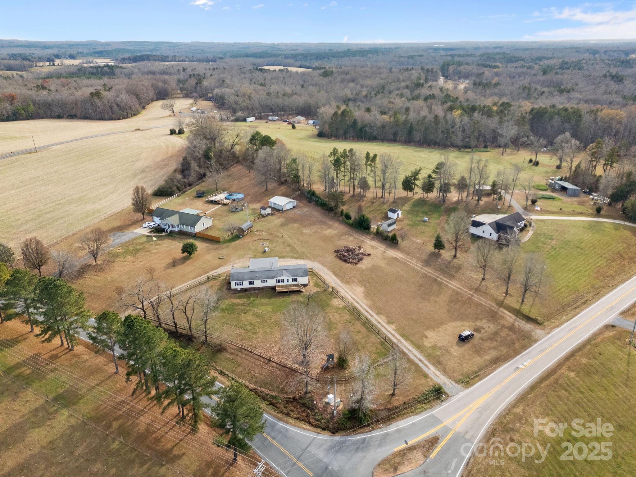 21465 Old Beatty Ford Road Richfield, NC 28137 - Photo 2 of 41 an aerial view of a house with a ocean view