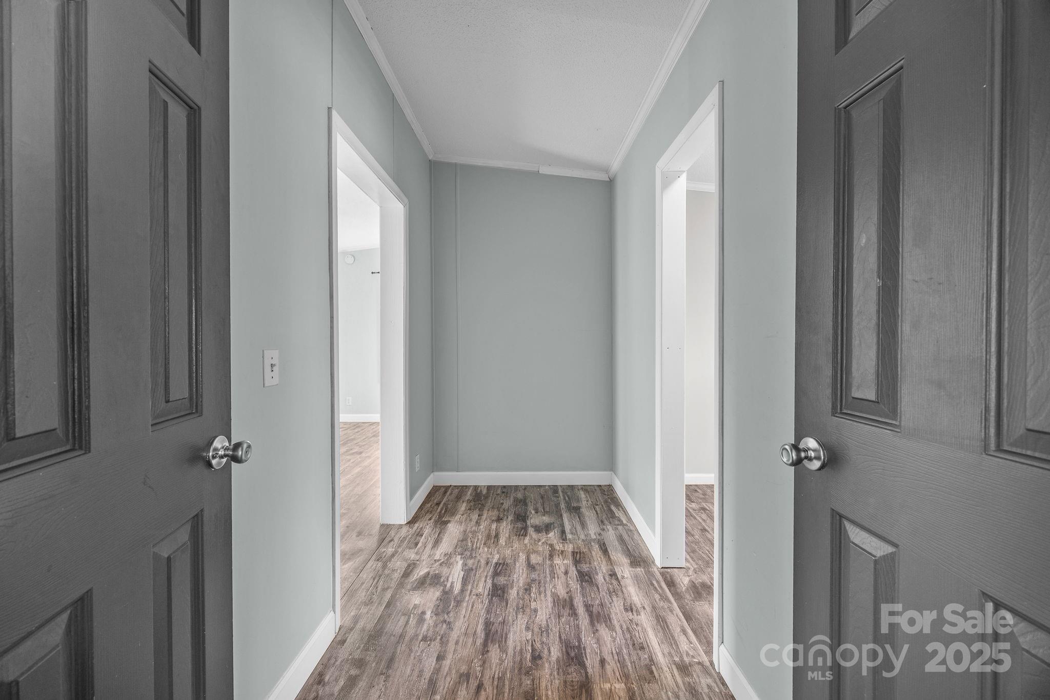 21465 Old Beatty Ford Road Richfield, NC 28137 - Photo 24 of 41 a view of a room with wooden floor and a bathroom