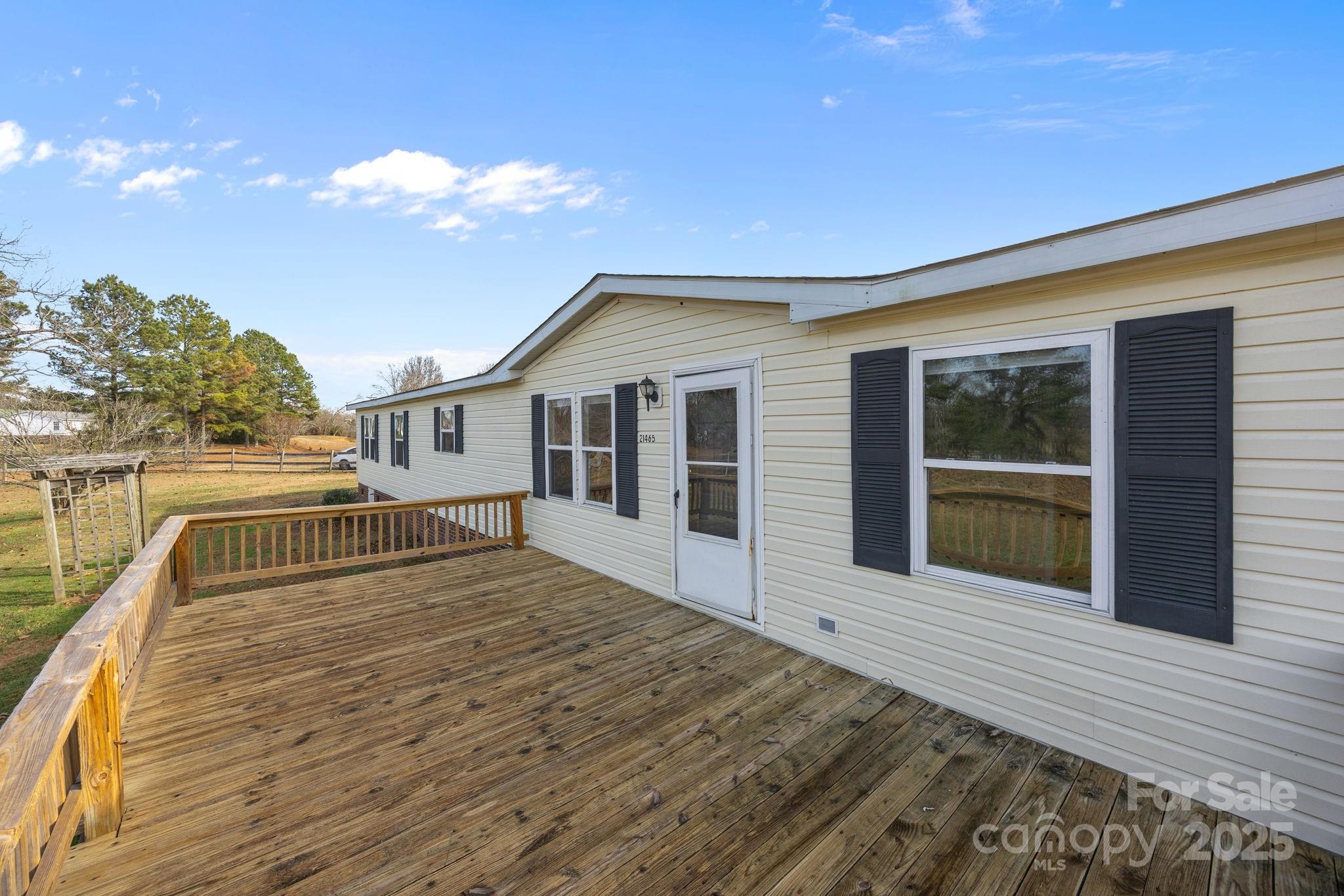 21465 Old Beatty Ford Road Richfield, NC 28137 - Photo 3 of 41 a view of house with backyard and porch