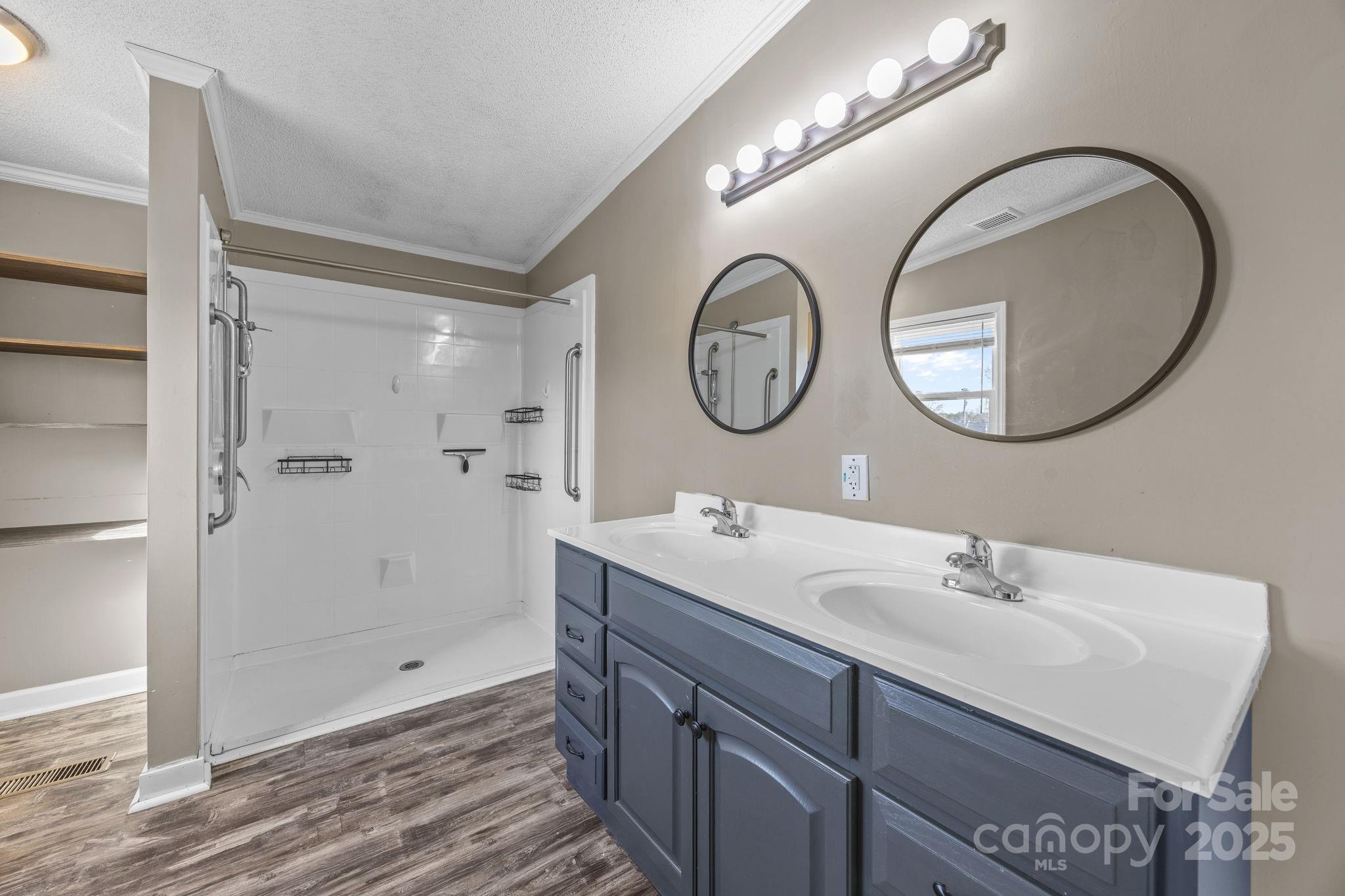 21465 Old Beatty Ford Road Richfield, NC 28137 - Photo 31 of 41 a bathroom with a sink and a mirror