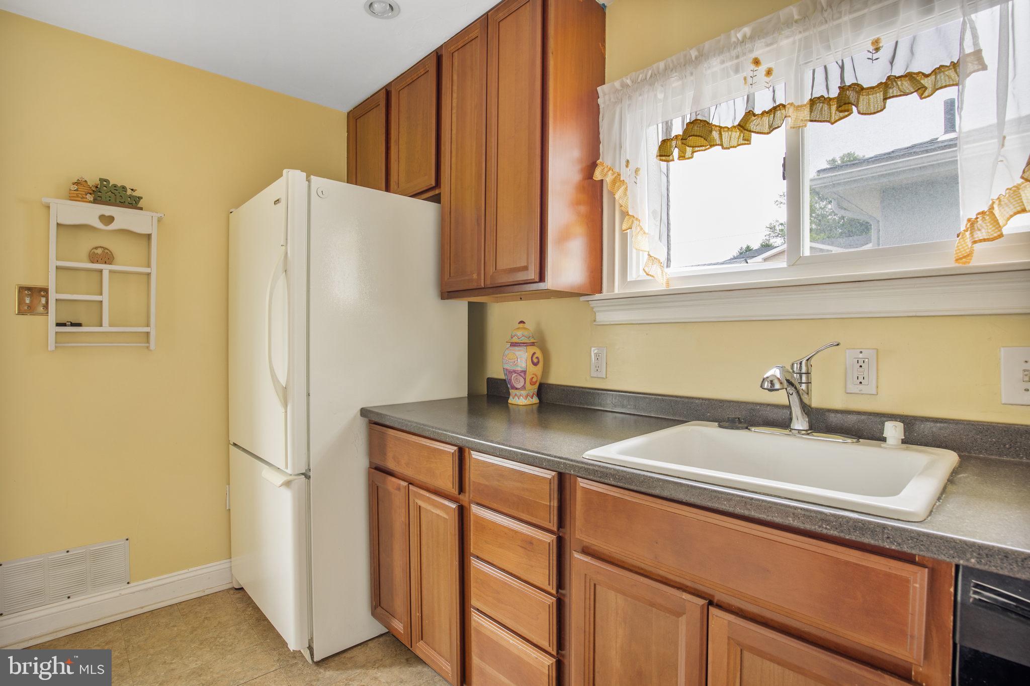 1005 North Providence Road Media, PA 19063 - Photo 11 of 23 Kitchen with man door to the garage area.
