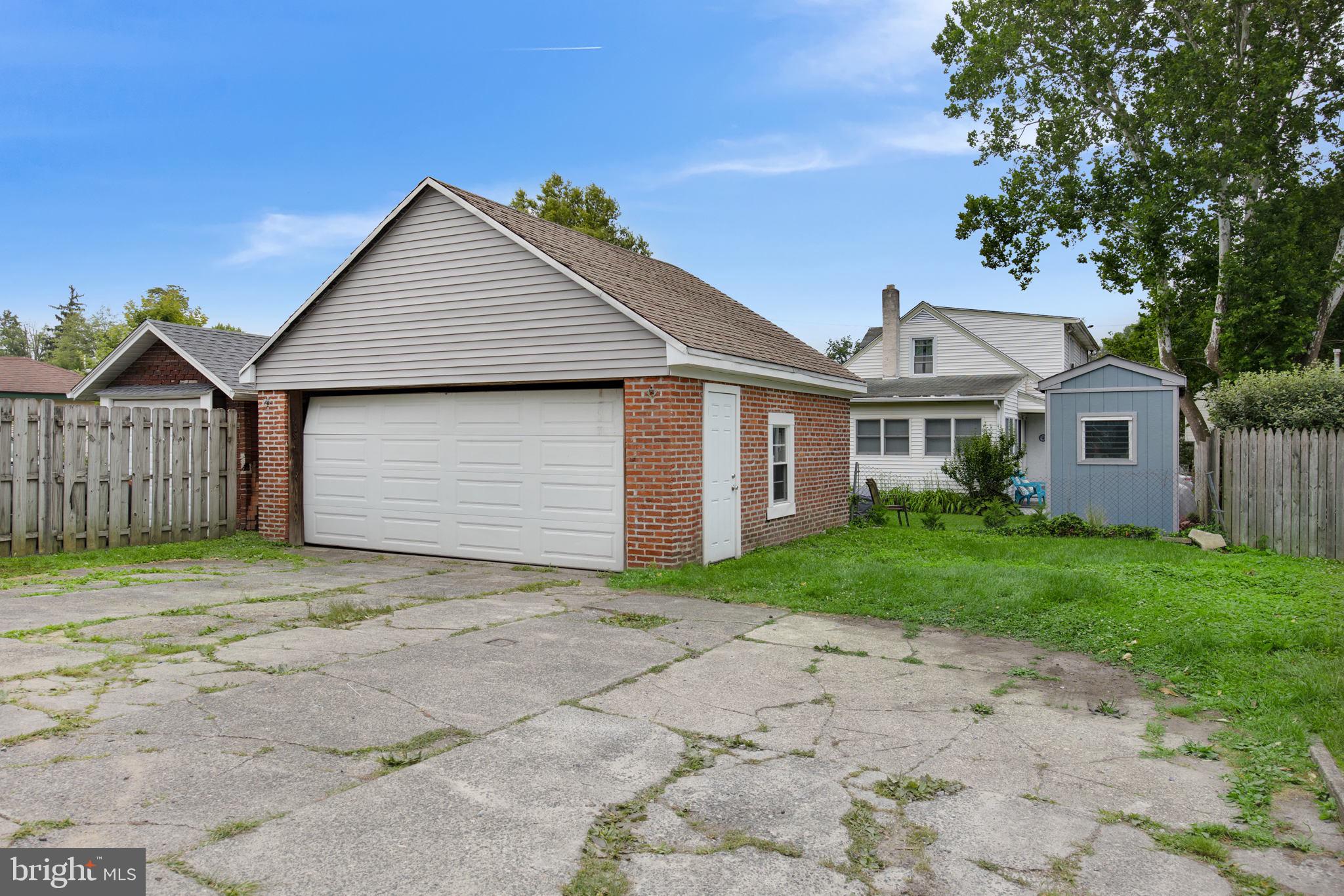 1005 North Providence Road Media, PA 19063 - Photo 22 of 23 2 car garage with a man door.