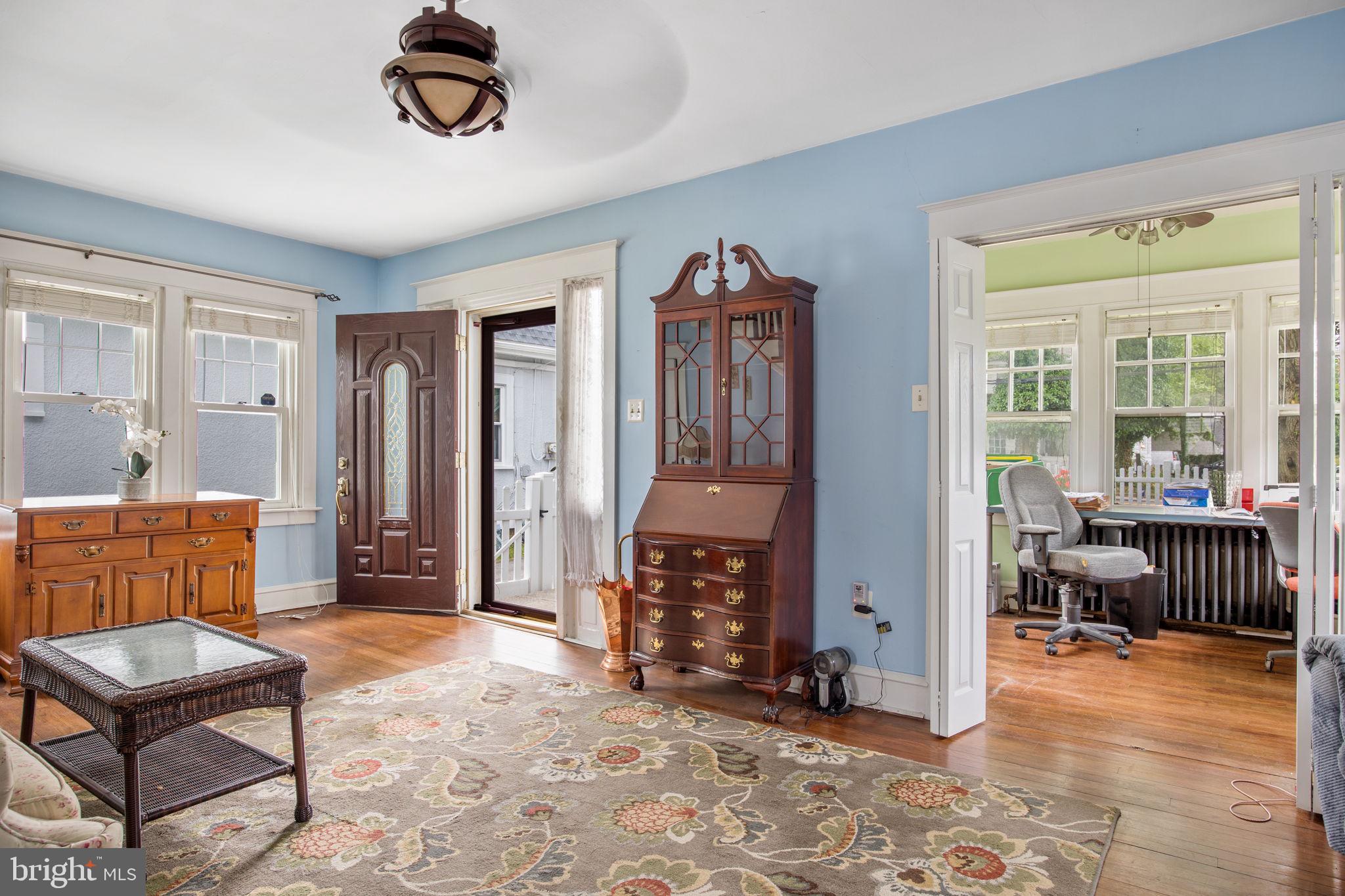 1005 North Providence Road Media, PA 19063 - Photo 5 of 23 Living area open to a sunroom or an office space.