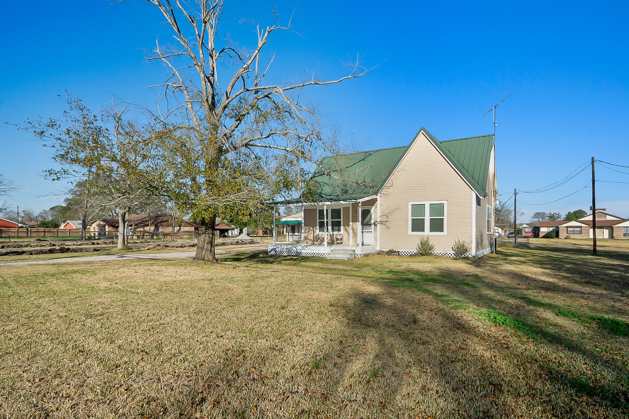 109 Maple Street Highlands, TX 77562 - Photo 1 of 50 a view of a house with a yard