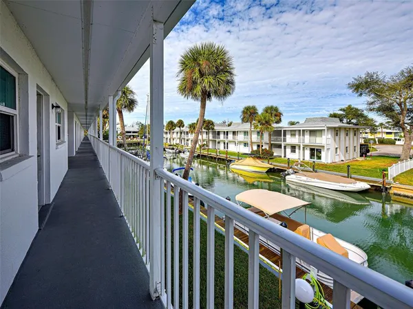 a view of swimming pool from a balcony