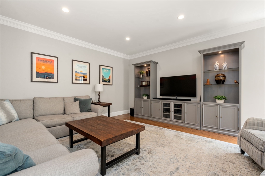 16 Winfield Street Needham, MA 02492 - Photo 12 of 42 a living room with furniture and a flat screen tv