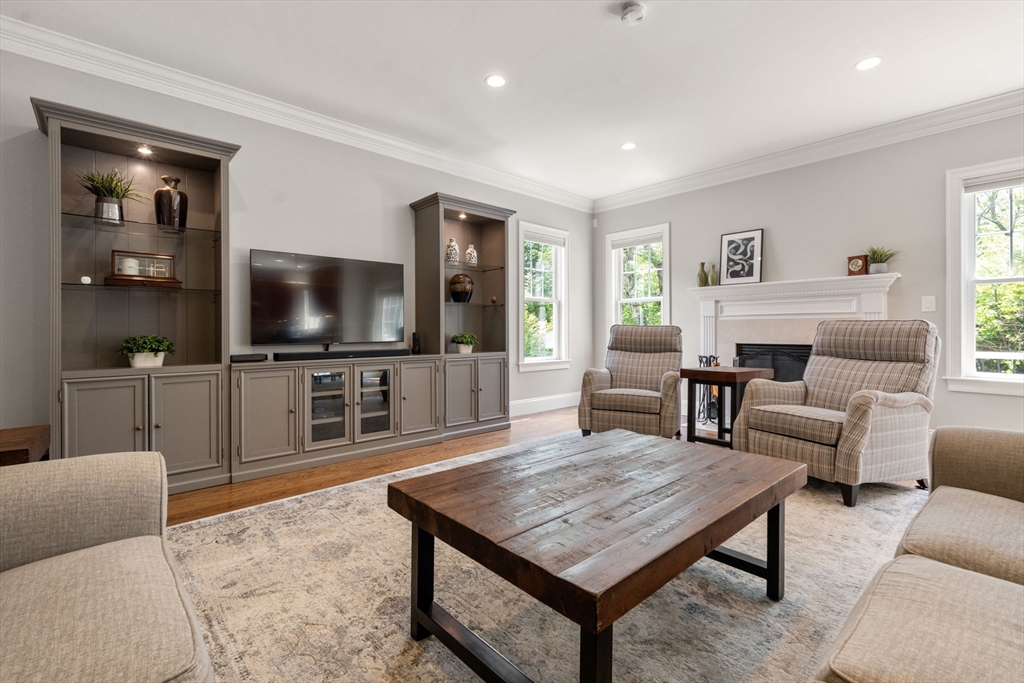 16 Winfield Street Needham, MA 02492 - Photo 13 of 42 a living room with furniture and a flat screen tv