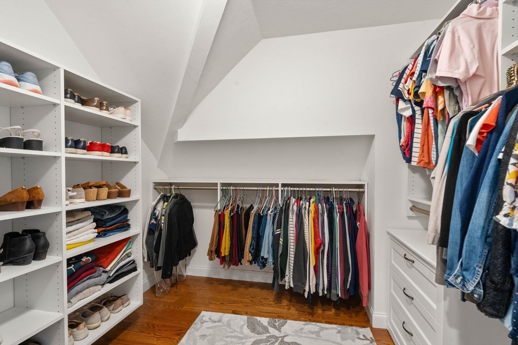 16 Winfield Street Needham, MA 02492 - Photo 20 of 42 a view of walk in closet with clothes and shoes
