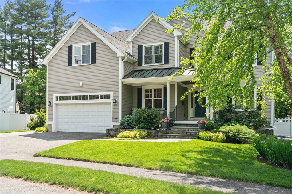 16 Winfield Street Needham, MA 02492 - Photo 2 of 42 a front view of a house with a yard and an trees