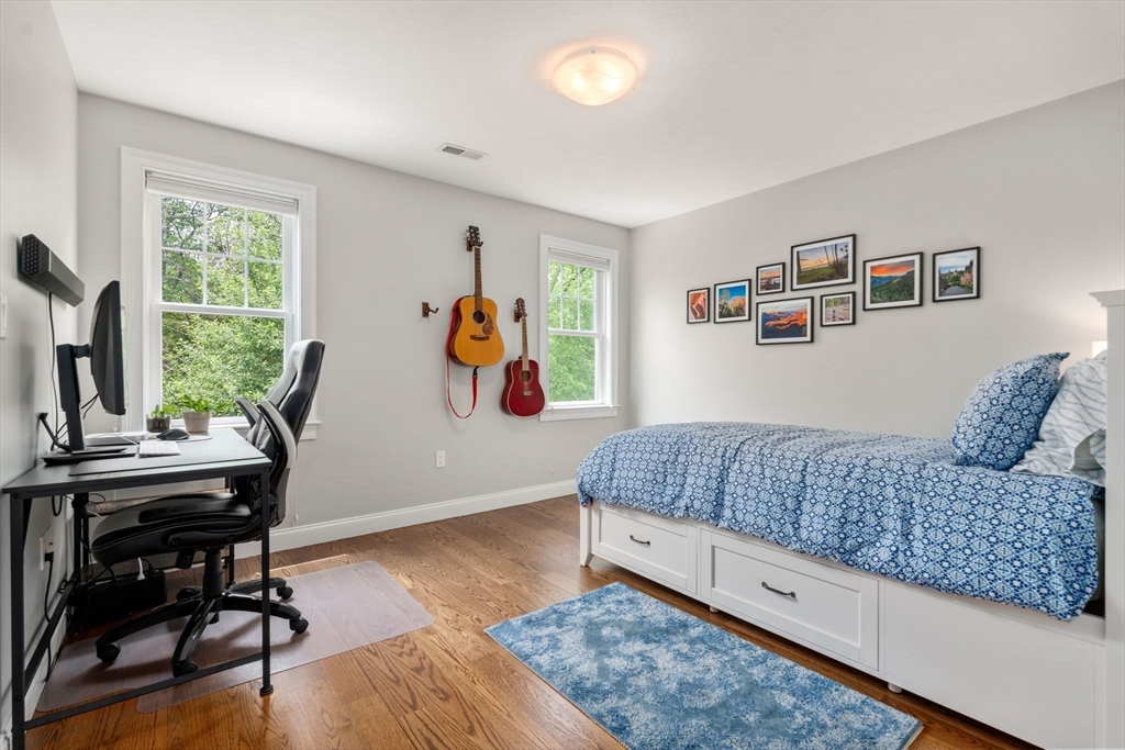 16 Winfield Street Needham, MA 02492 - Photo 27 of 42 a bedroom with a bed and a window