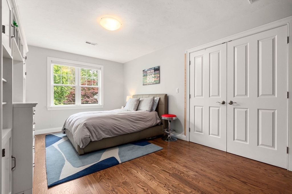 16 Winfield Street Needham, MA 02492 - Photo 28 of 42 a bedroom with a bed and a window