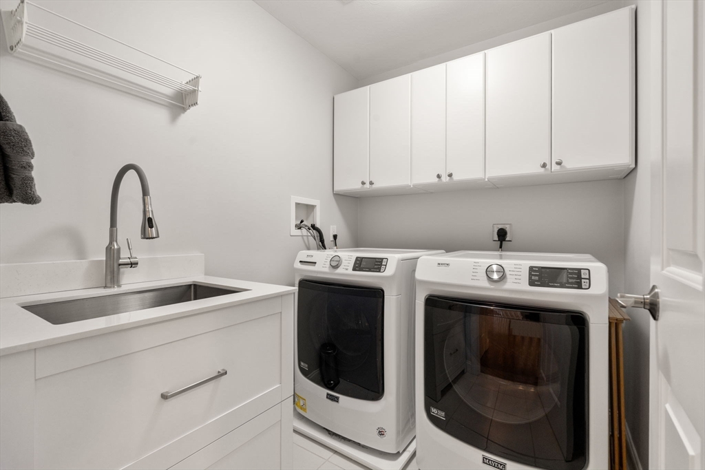 16 Winfield Street Needham, MA 02492 - Photo 30 of 42 a utility room with dryer and washer