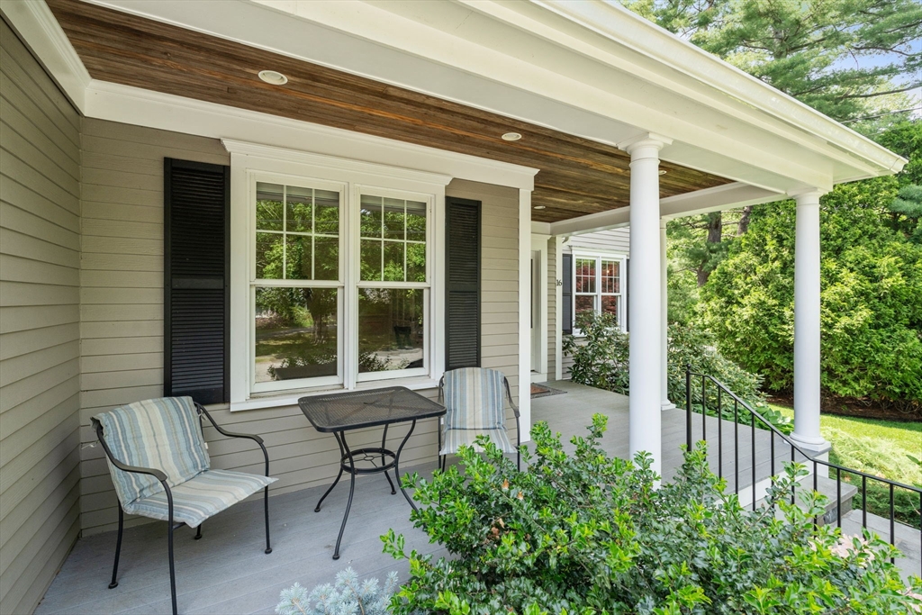 16 Winfield Street Needham, MA 02492 - Photo 3 of 42 a view of a chair and table in the balcony