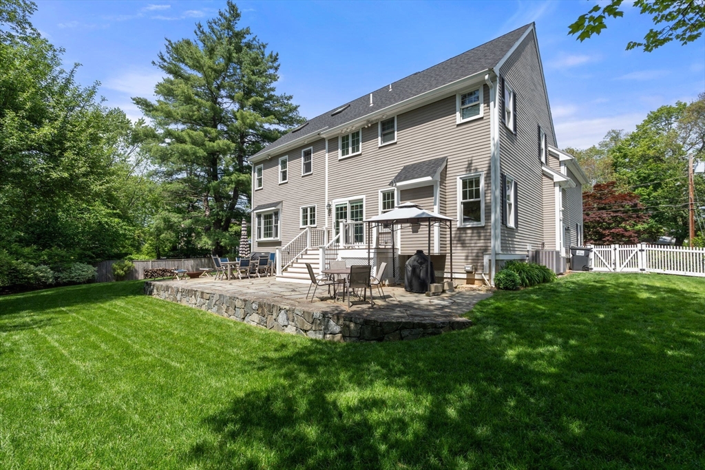 16 Winfield Street Needham, MA 02492 - Photo 38 of 42 a view of house with backyard and sitting area