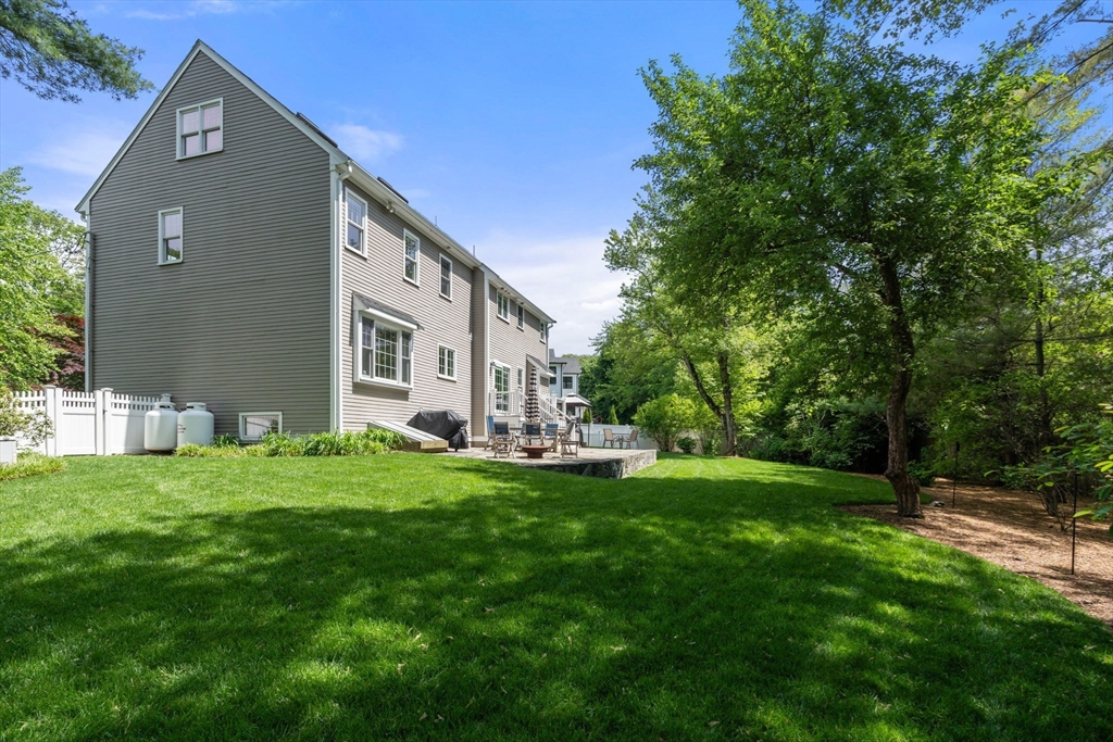 16 Winfield Street Needham, MA 02492 - Photo 39 of 42 a view of a house with a yard