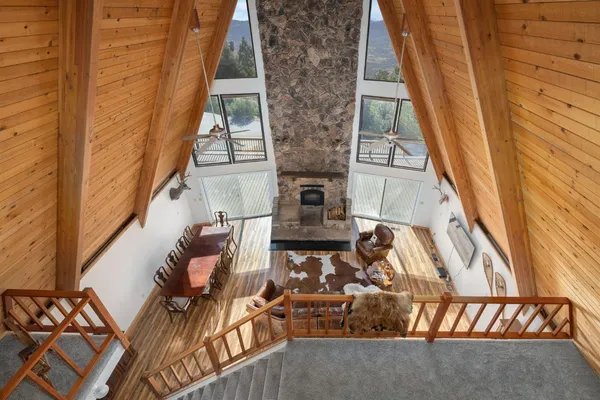 a view of balcony with furniture