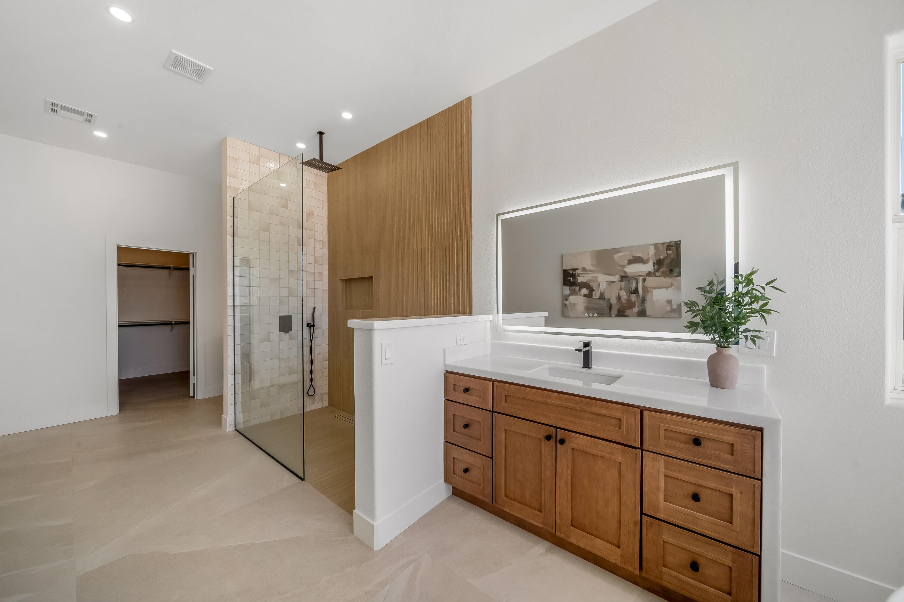 80262 Amazon Avenue Indio, CA 92201 - Photo 51 of 69 a bathroom with a granite countertop sink mirror and shower