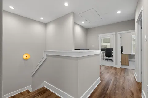 a view of a workspace with furniture