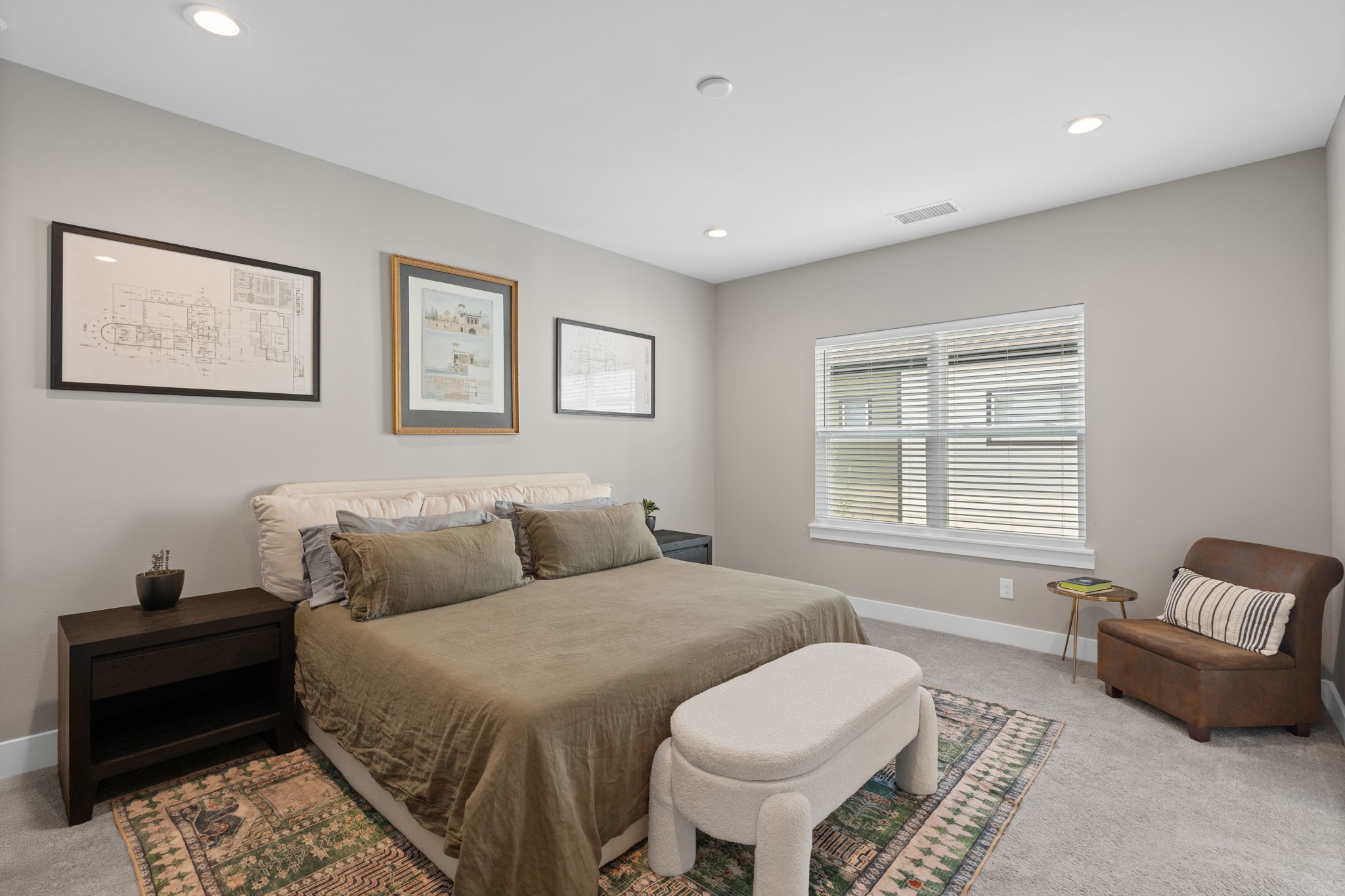 5903 Wheatley Street Houston, TX 77091 - Photo 19 of 32 a bedroom with a bed and a couch