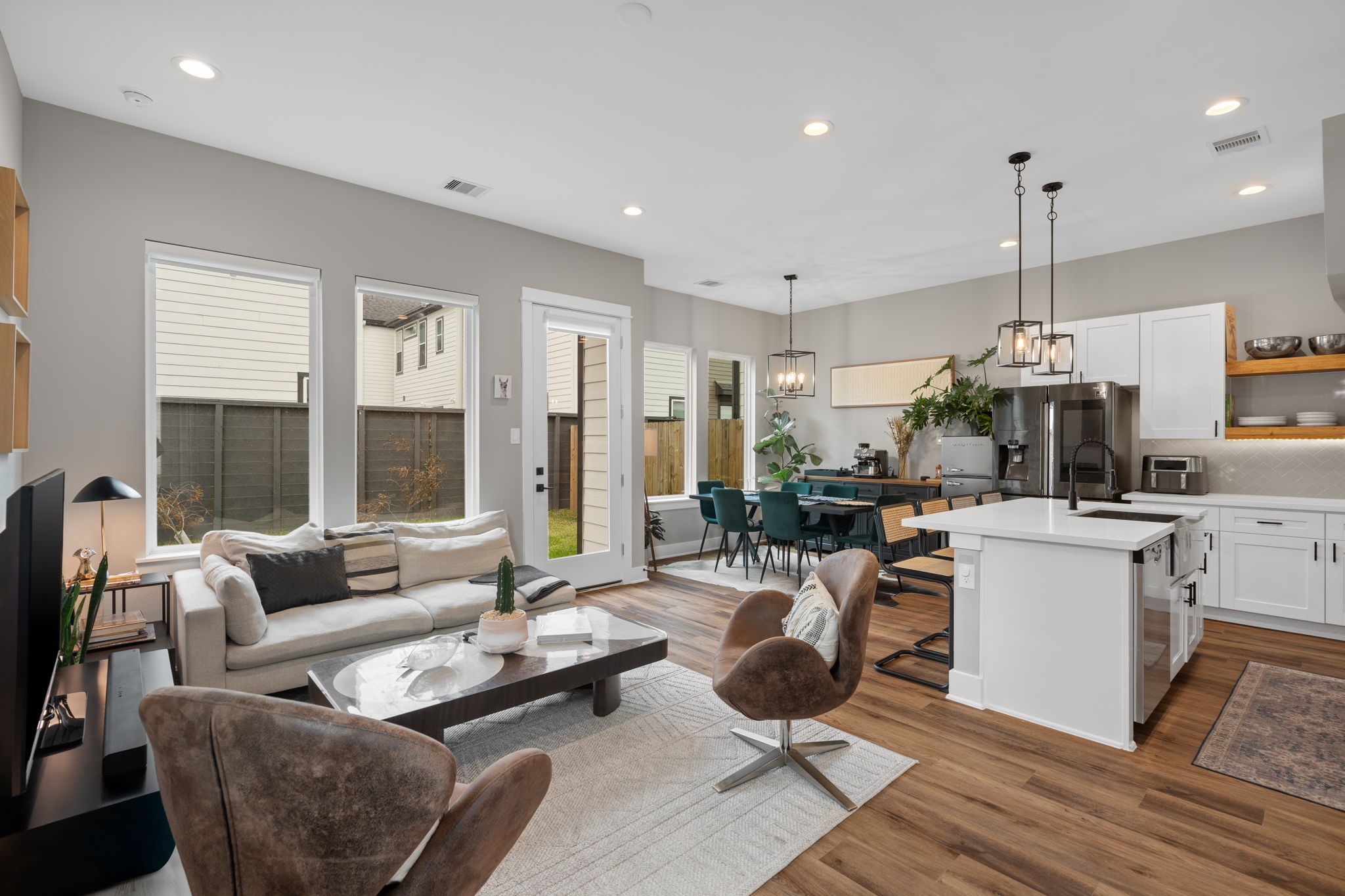 5903 Wheatley Street Houston, TX 77091 - Photo 2 of 32 a living room with furniture and a large window