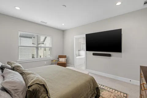 a bathroom with a double vanity sink mirror and double