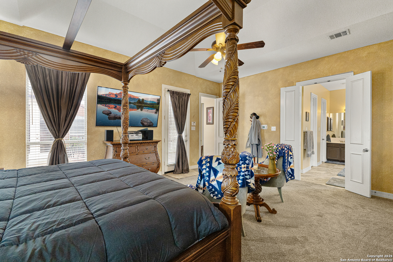 418 Texas Point San Antonio, TX 78258 - Photo 12 of 31 a bedroom with bed and a window