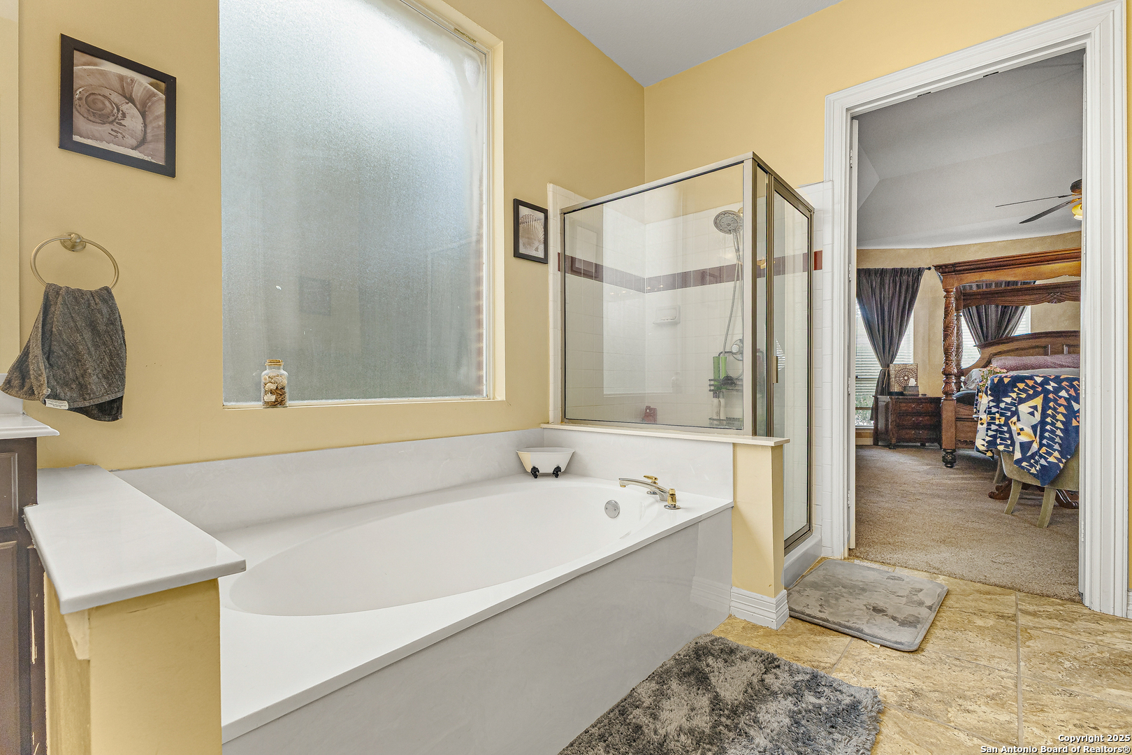 418 Texas Point San Antonio, TX 78258 - Photo 13 of 31 a bathroom with a bathtub and a shower